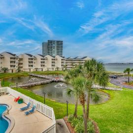 Remodeled condo with bay views pool fishing pier & easy beach access
