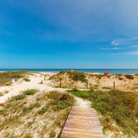 Dog-friendly beachfront home with private boardwalk park style grill deck beach view, hotel in St. George Island