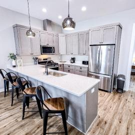 Dog-friendly home with two full kitchens balcony AC washers & dryers