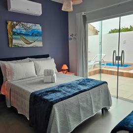 Casa piscina privativa e Área Gourmet - Condomínio 24 hs, hotel in Araruama