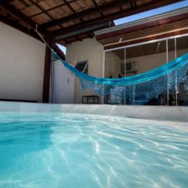 Casa na Praia com Piscina Aquecida, Privativa e Acessivel