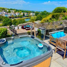 Quirky cottage lake views hot tub wood burner dog friendly near the coast path fishing villages and national parks