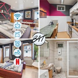 BAT Home Solutions Trier-Euren - alles was ein Hotel nicht bietet - 35 qm Ferienwohnung, Heimkino, Wallbox, Küche für 4 Personen