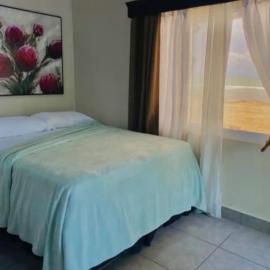 Buho's Villas 2BEDS Hawaii Resturante y Bar, hotel v destinaci La Ceiba