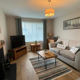 Two bedroom house with enclosed gardens and 2 car drive
