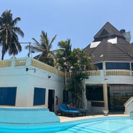 Luxurious 3-Bedroom Holiday House with Pool Access in Diani Beach