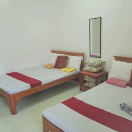 Mamita Seaside Resort، فندق في Guinisiliban