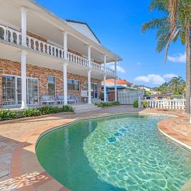 Stunning 4BR Holiday Home with Water Views & Pool