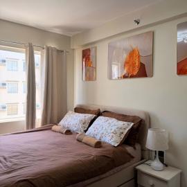 The Urban Hideout - 1 BR Cozy Studio in Marina Spatial Condo Dumaguete City, hotelli kohteessa Piapi