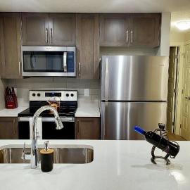 Cozy 1-Bedroom Condo in Calgary with Private Entrance