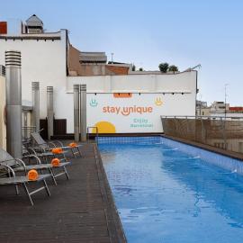 Stay Unique Apartments Pau Claris con piscina, hotel en Barcelona