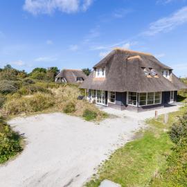 Luxe Duinvilla Stern met sauna voor 8 personen nabij strand en dorp Nes