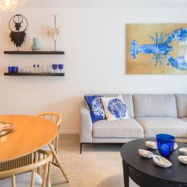 Modern coastal apartment with terrace & pool acces