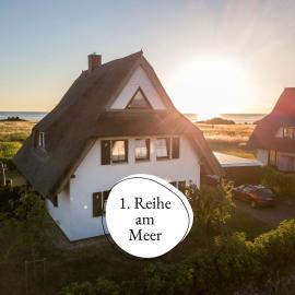 Ferienhaus Meerestraum Rügen - erste Reihe, Panorama-Meerblick & Kamin, Hund willkommen, ruhige Lage, 150 m zur Ostsee