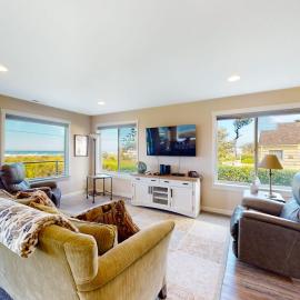 Bright modern home with great ocean views & deck - walk to the beach