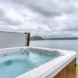 Dog-Friendly Bayfront Home with Private Hot Tub Water & Bridge Views Free WiFi