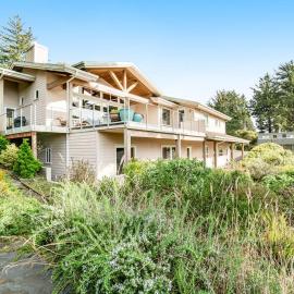 Dog-friendly ocean-view home near the beach with large deck grill & Ping-Pong