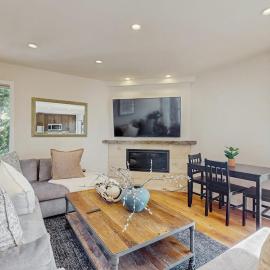 Pristine Modern Condo with Lake Views Fireplace Access to Private Beach