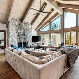 Amazing woodland home with private hot tub fireplace & serene lake view deck