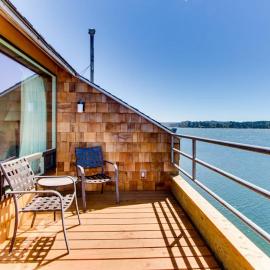 Waterfront Condo with Private Deck Bay Views Pool Hot Tub & Sauna