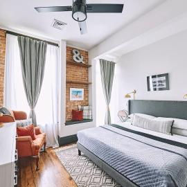 Luxe Main St Loft with Rooftop Lounge and Balcony