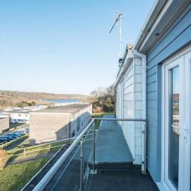 Charming Beach Chalet with Balcony & Sea Views