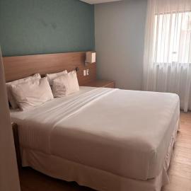 Suíte King Premium no Radisson Localização Excelente