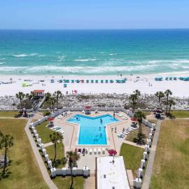 Modern 6th-floor condo with furnished balcony ocean views pools & beach access