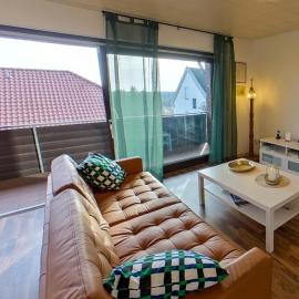 Apartment in Hanglage mit Garten und Balkon