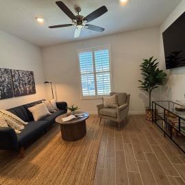 Modern Guest Suite with Living Room and King Bed
