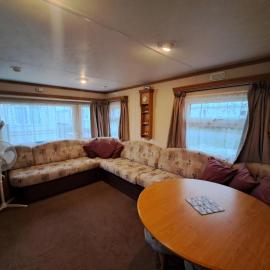Plum 3 a luxury 2 bed 6 berth static caravan, bedding included, secure veranda with ramped access on Coral Beach in Ingoldmells