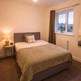 Contemporary 3-Bedroom Home Quiet Rotherham Location with Parking