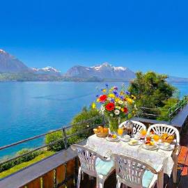 Lake Thun Alps Scenic Views and Concierge by SwissHut, khách sạn ở Merligen