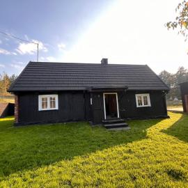 Stary Drewniany Dom blisko jeziora, Hotel in Rychnowy