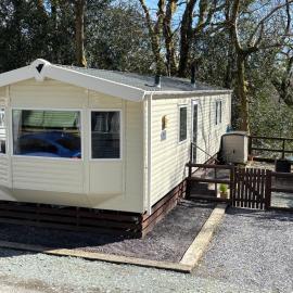 3 Bed Woodland Caravan, отель в городе Prenteg