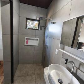 Quatro com suite e cozinha