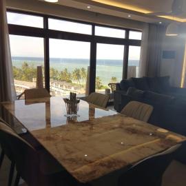 Tulivu Stays Sandyshore Apartments、Kikambalaのホテル