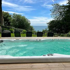 Stunning property with sea views and heated swimspa