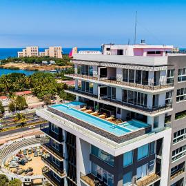 Resort condo with balcony, scenic view, rooftop pool, & well-equipped kitchen