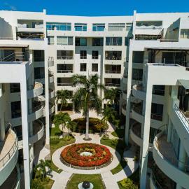 Ocean-view condo with private rooftop pool, terrace, & resort-style pool
