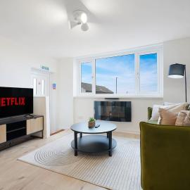 Stylish Seaside Stay with Balcony Walking Distance to Beach