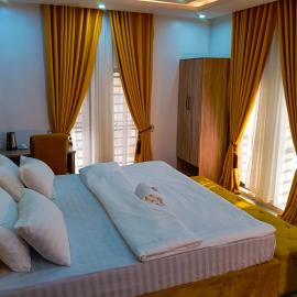 Joebrown Palace Hotel & Suite, хотел в Akitan