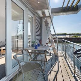 Hausboot Sutje, hotel in Großenbrode