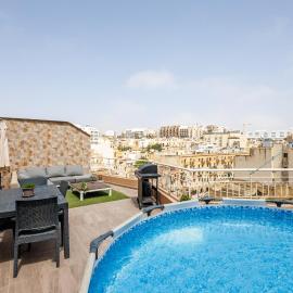 Bright 3BR Penthouse with Pool & BBQ in Msida by QuickTrips