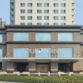Four Points by Sheraton Wuxi Liangxi, хотел в Уси