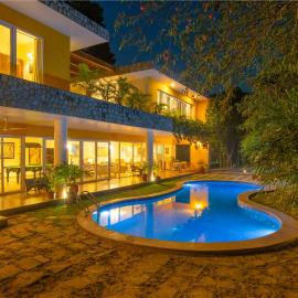 StayVista at The Hideout Farms with Lawn and private Pool