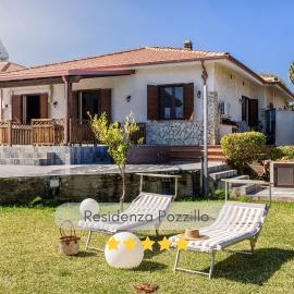Residenza Pozzillo, villa con giardino e area giochi bambini a 700 m dal mare
