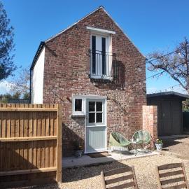 The Coach House, hotel en Bourne