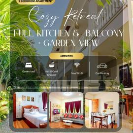 Retreat to a Stylish Flat w/ Balcony + Garden View, hotel em Liloan