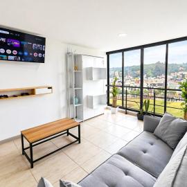 Apartamento amplio frente a Santo Tomás con parqueadero privado y wifi
